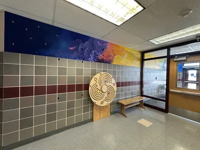 Rocky Mountain interior ribbon, mural in the front office area with flowing tree branches