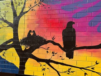 Rocky Mountain Elementary mural, close-up of the colorful eagle head with peach blossoms