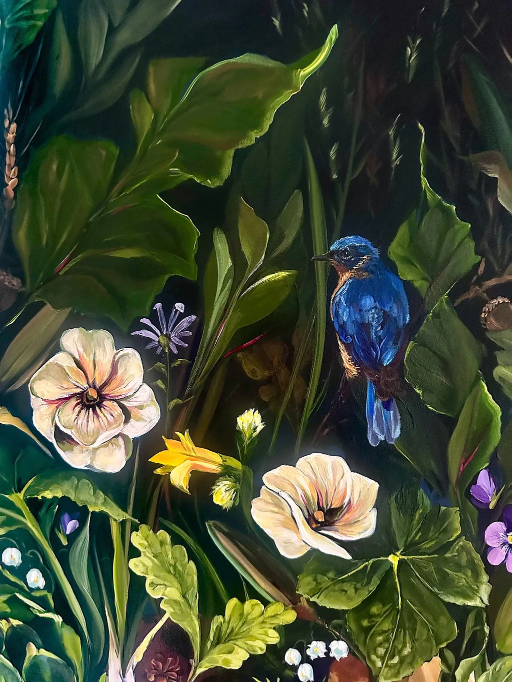 Garden Gem detail with a blue bird, flowers, and layered green leaves